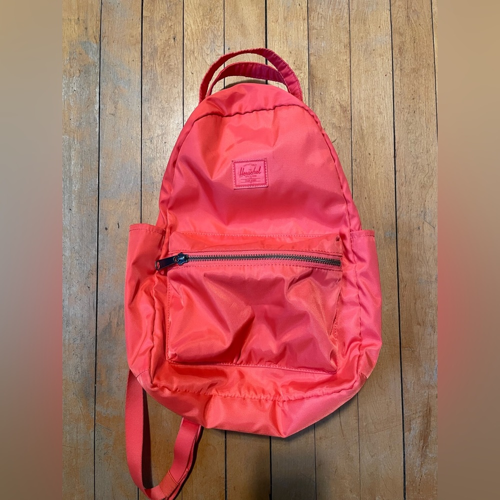 HERSHEL small orange/coral bag pack.